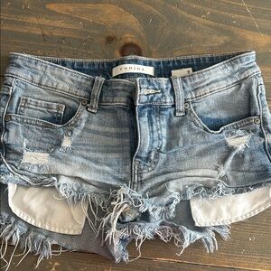eunina Light Blue Distressed Denim Cutoff Shorts